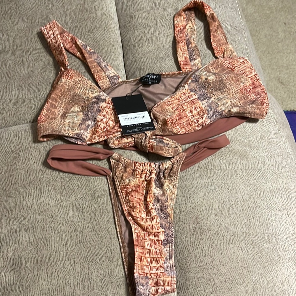 Swim suit. Icon swim city girls. Pink,purple, brown bikini. Size small